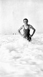 Fritz Escher went west at age 19 to have an adventure. Here he is in the Pacific surf in his green,  wool Janzen swimming suit, circa 1929.
